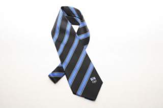Photograph of New College black and blue striped tie with college coat of arms