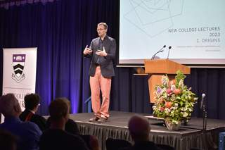Speaker on stage at New College Lectures